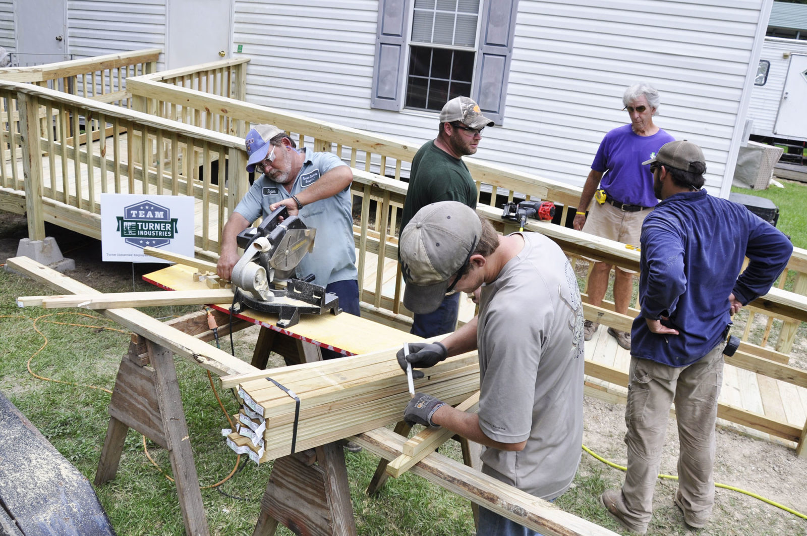 Turner Industries' employees woodworking.