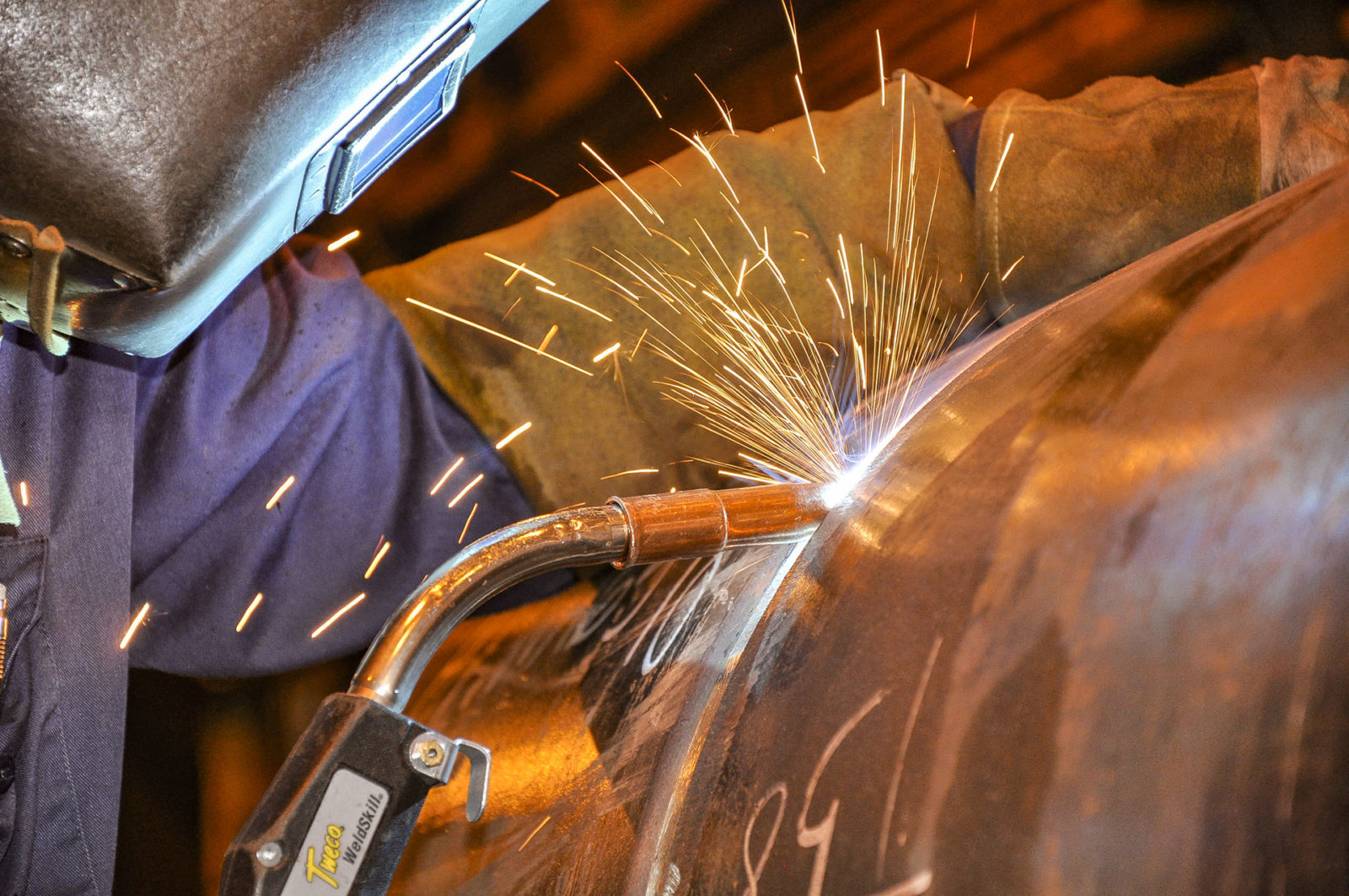 A person welding, close up.